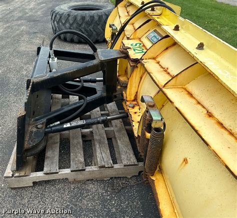 snow wolf skid steer plow|plow wheels instead of skids.